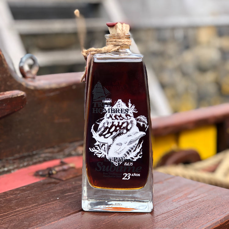 A bottle of the new Tres Hombres Captain's Choice Rum "The Queen". A 23 year-old rum from La Palma, distillery Aldea, transported by engineless sailing vessel Tres Hombres.