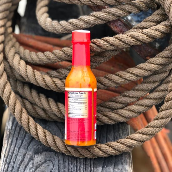 Aunt May' Bajan Pepper Sauce from Barbados. Side of the bottle.